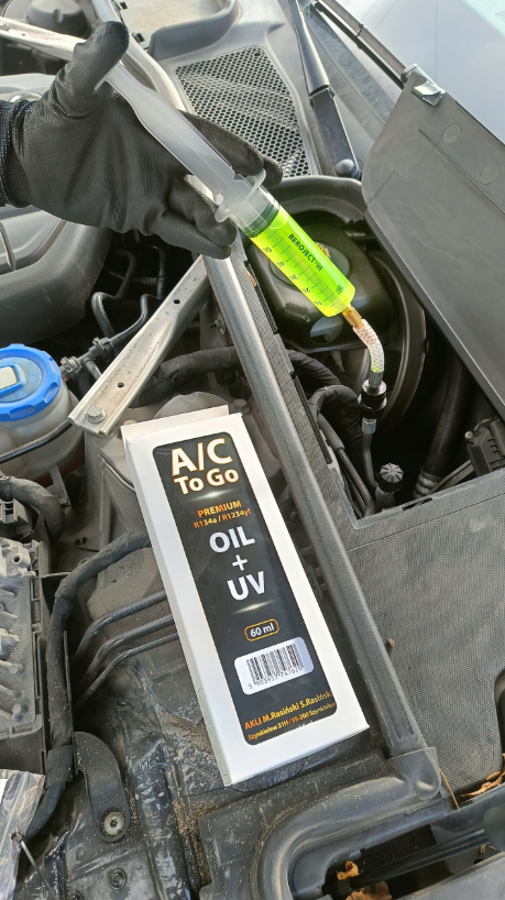 Set zum Nachfüllen von Öl in der Autoklimaanlage mit R134a-Gas Set zum Nachfüllen von Öl in der Autoklimaanlage mit R134a-Gas
